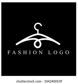 Modern fashion logo. hanger logo design on black background.minimalist outline hanger logo