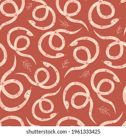 Modern folksy floral snake seamless vector pattern. Boho ornate mystic animal reptile illustration in earthy warm palette print design. Bohemian desert vibes textile fabric decor print