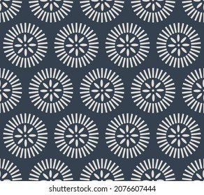 Modern geometric flower motif on black background. Circle flower pattern.