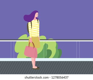 Modern Girl on a autowalk or horizontal escalator