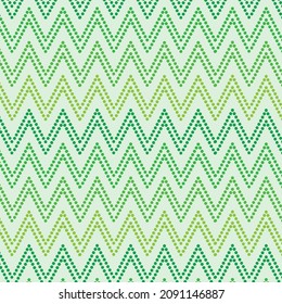 Modern green dotted chevron seamless pattern. Great for texture,  home décor, textile and wallpaper 