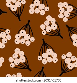 Modern hand drawn autumn pattern with abstract branches of  berries on brown background. Cute autumn print in childish style for fabric design, wallpaper, wrapping paper