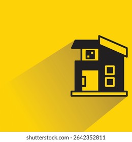 modern house building icon with shadow on yellow background