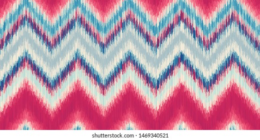 Modern Ikat Chevron Seamless Repeat Vector Pattern Swatch.  Ancient Indonesian Weaving Technique.  Ombre, gradient, colorful. Zig zag.