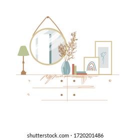 
Modern interior design. Round mirror, pampas grass in a vase, framed posters and a chest of drawers. Boho style room. Trend home decor