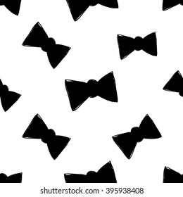 Modern kids b&w seamless pattern with bow tie. Hand drawn graphic with black cute minimalistic scandinavian cartoon elements on white background