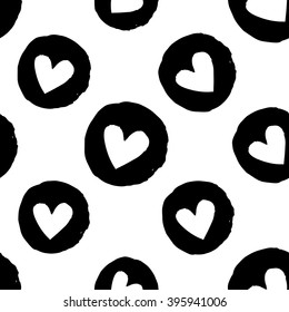 Modern kids b&w seamless pattern with circle heart. Hand drawn graphic with black cute minimalistic scandinavian cartoon elements on white background