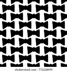 Modern kids b&w seamless pattern with bow tie. Hand drawn graphic black and white cute minimalistic scandinavian cartoon elements on white background