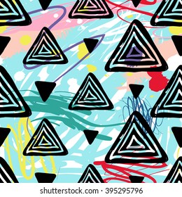 Modern kids seamless pattern with delta and pyramid. Hand drawn graphic with cute minimalistic scandinavian cartoon elements on color artistic watercolor background
