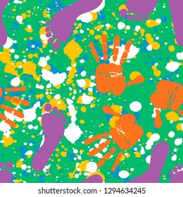 Modern kids seamless pattern with handprint and footprint. Cute cartoon elements on color splats artistic background
