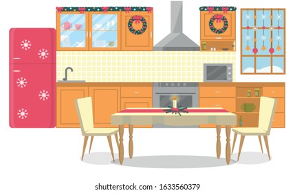 Modern Kitchen Interior and New Year Holiday Decor. Furniture Decorated with Wreaths and Fir Branches, Refrigerator with Snowflakes. On Window Hangs Christmas Garland. Candlestick Stands on Table