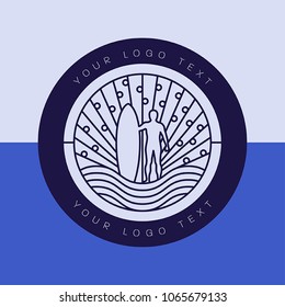 A modern logo of a surfer silhouetted in front of abstract waves and sky