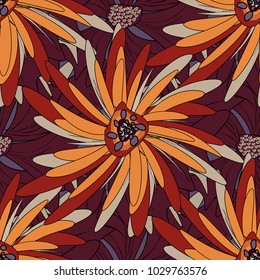 Modern luxury texture for fabrics, textile. Vector floral seamless pattern. Background wallpaper illustration with red, yellow and brown flowers and vintage paisley ornaments.