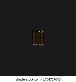 Modern minimal luxury elegant trendy unique black and golden color UO OU U O initial based letter icon logo.