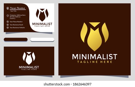 Modern Minimalist M Negative Space Logo Design and template. Golden elegant M initials icon vector