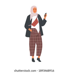 Modern Muslim woman wearing trendy casual clothes and hijab using phone. Fashion Arab female character in trousers and traditional headdress. Flat vector illustration isolated on white background