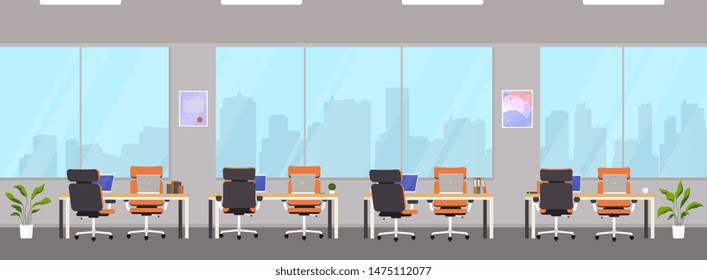 Modern office center with workplaces. Empty workspace for co-working, design business room with large windows, desktops and chairs, computer equipment.