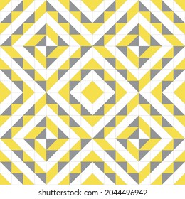 Modern pattern consisting of a triangle of three colors. Seamless patterns for trendy fabrics, decorative pillows, wrapping paper, interior design. Trending colors gray and yellow 2021. Vector.