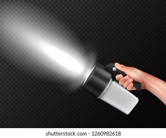 Modern powerful high lumen handheld torch flashlight in hand realistic composition against dark transparent background vector illustration