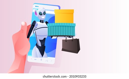 modern robot holding colorful purchases shopping bags on smartphone screen artificial intelligence technology concept