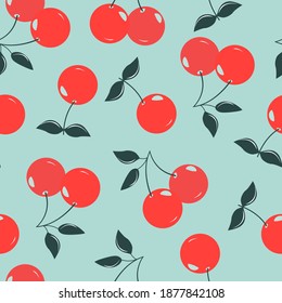 Modern seamless cherry pattern. Large bright berries on a blue background. fashionable design for scrapbooking, fabric, wallpaper. Vector illustration.