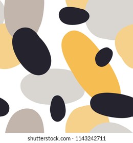 Modern seamless pattern with abstract colorful shapes: circles, ovals. Doodle hand drawn texture. Trendy creative confetti background for printing for modern and original textile, wrapping paper
