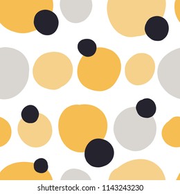 Modern seamless pattern with abstract colorful shapes: dots, circles. Doodle hand drawn texture. Trendy creative confetti background for printing for modern and original textile, wrapping paper 