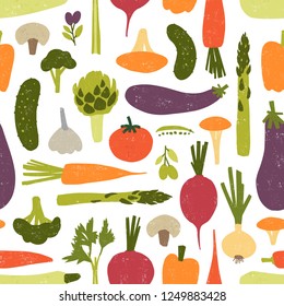 Modern seamless pattern with delicious vegetables or harvested crops on black background. Backdrop with healthy vegetarian food products. Vector illustration for textile print, wrapping paper.