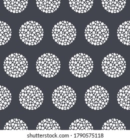 Patrón moderno sin costuras con piedras blancas en un círculo sobre un fondo gris. Diseño vectorial único para baldosas, papel pintado, textiles, ropa y otros.