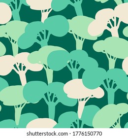 Modern seamless vector simple colourful pattern with trees in green tones 