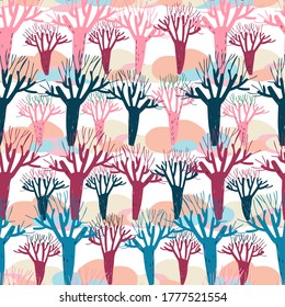 Modern seamless vector simple colourful pattern with winter trees