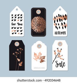 Modern set of autumn, fall sale and quality labels, gift tags. Lettering, hand drawn leaves, floral elements. Isolated vector objects, illustrations. 