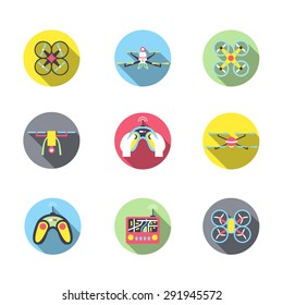 Modern set of vector icons of quadcopters and remote control. Trendy flat design with long shadow. Front and top view of air drones. Excellent art for web design and advertising.