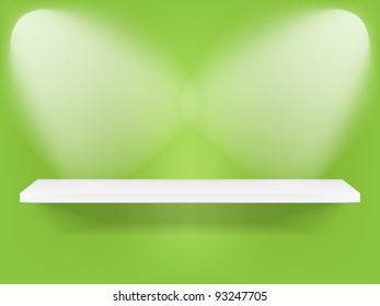Modern shelf on green wall with lights