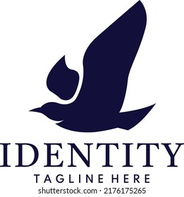 modern and simple silhouette flying bird logo design concept