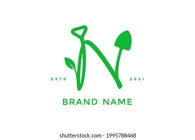 Modern and Sleek logo design Initial N Shovel and leaf.