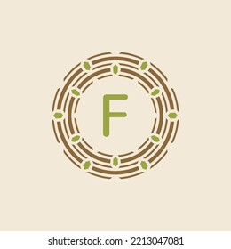 modern and sophisticated letter F nest logo. simple and memorable nest leaf tech circle emblem.