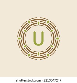 modern and sophisticated letter U nest logo. simple and memorable nest leaf tech circle emblem.