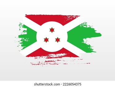 Modern style brush painted splash flag of Burundi with solid background