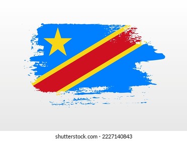 Moderner Stilpinsel gemalt Splash-Flagge der Demokratischen Republik Kongo mit festem Hintergrund