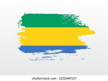 Modern style brush painted splash flag of Gabon with solid background