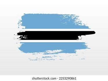Moderne Pinselstriche mit Splash-Fahne von Botswana auf solidem Hintergrund