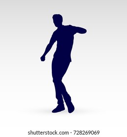 Modern Style Dancer Posing Silhouette of a Man Dancer Hip Hop Choreography on a Gray