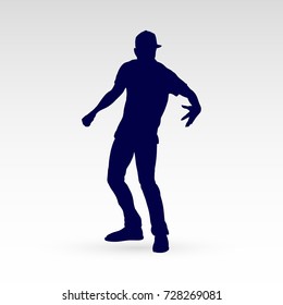 Modern Style Dancer Posing Silhouette of a Man Dancer on a Gray Background
