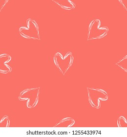 Modern style seamless vector background with hearts in Living Coral color.