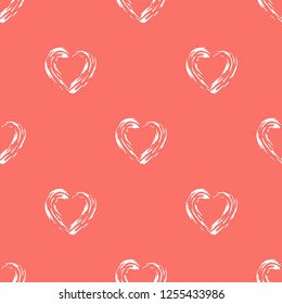 Modern style seamless vector background with hearts in Living Coral color.