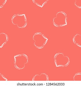 Modern style seamless vector background with hearts in Living Coral color.