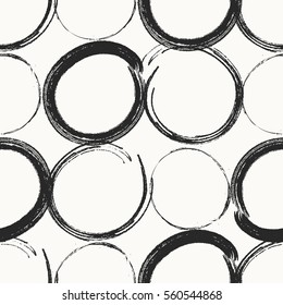 Modern stylish monochrome hand drawn geometric texture with rows of irregular circles. Repeating texture perfect for prints, textile and wrapping paper. Vector seamless pattern.