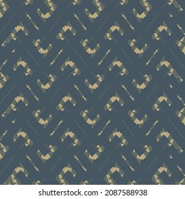 Diseño textil moderno compuesto por zigzags y otros elementos manchados. Decoración geométrica en tonos azules, grises y beige.