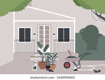 A modern two-story home with a small front porch displays potted plants, gardening tools, and a wheelbarrow with soil, suggesting an afternoon spent tending to the small garden